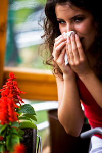 Woman Sneezing