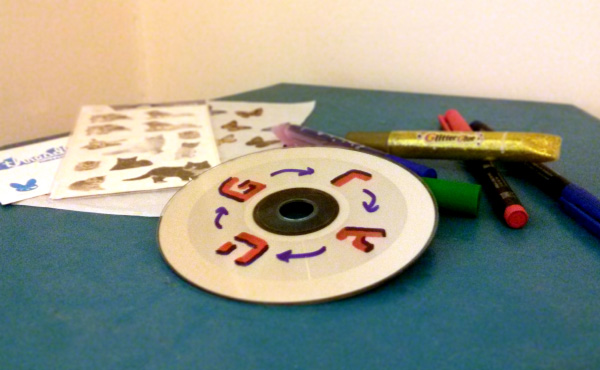 a cd and markers