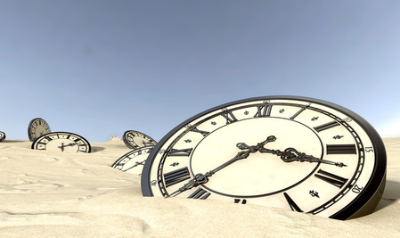 clocks in the desert sand