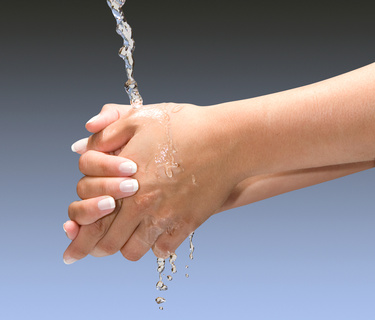 hands under water stream