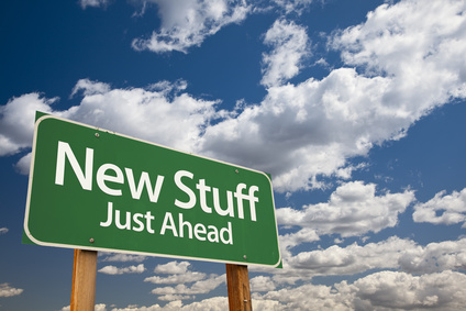 a road sign says 'new stuff'