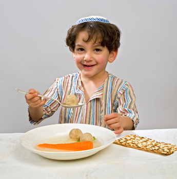 kid drinking soup