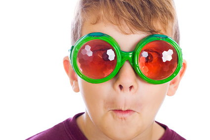 a kid wearing funny goggles