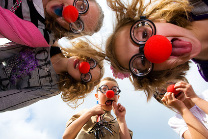 a group of kids with silly masks