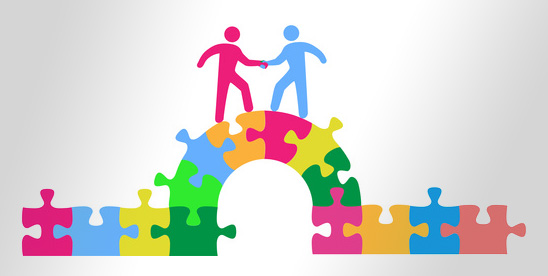 two cartoon characters standing on top of a bridge made of puzzle pieces, shaking hands